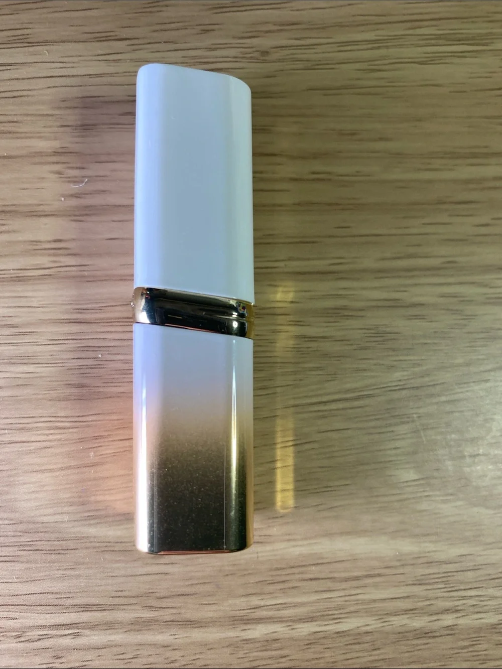 L'Oreal Gold Lipstick Tube with Vibrant Fuchsia Label 206